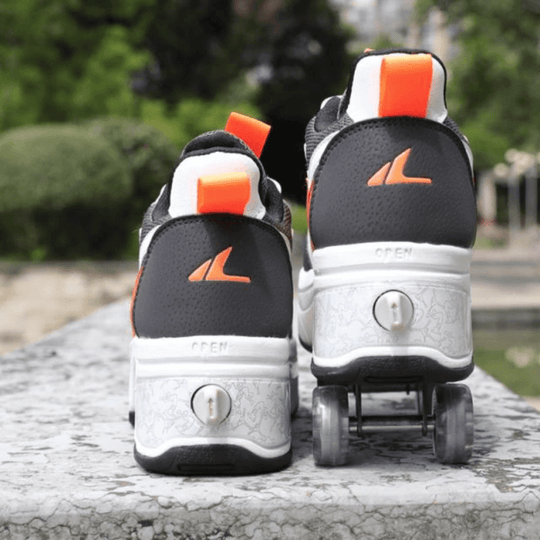 back view of orange Kick Speed VoltRunner roller skate shoes highlighting heel design and folded wheel system