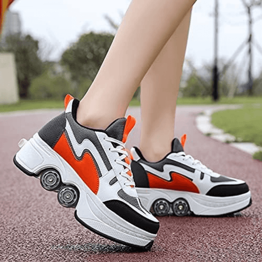 Orange roller sneakers gliding on running track, action shot