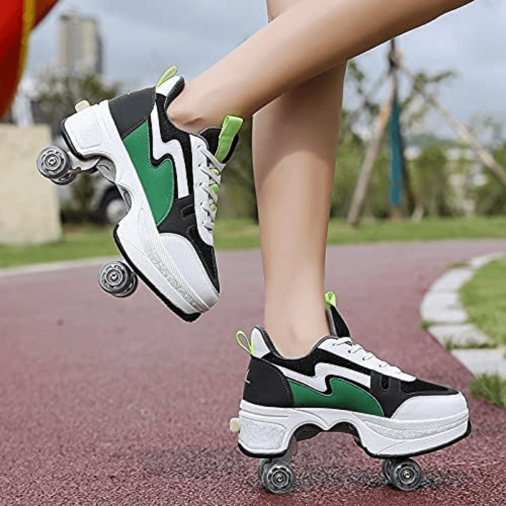 Person wearing black, white, and green roller shoes on a path with blurred background