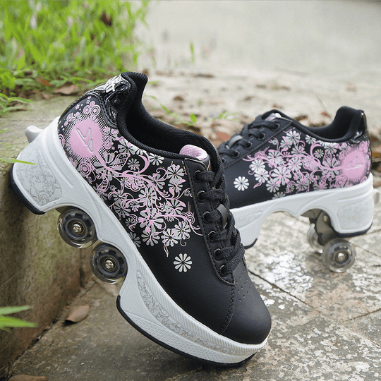 outdoor photo of black Kick Speed roller skate shoes with floral pattern and retractable wheels