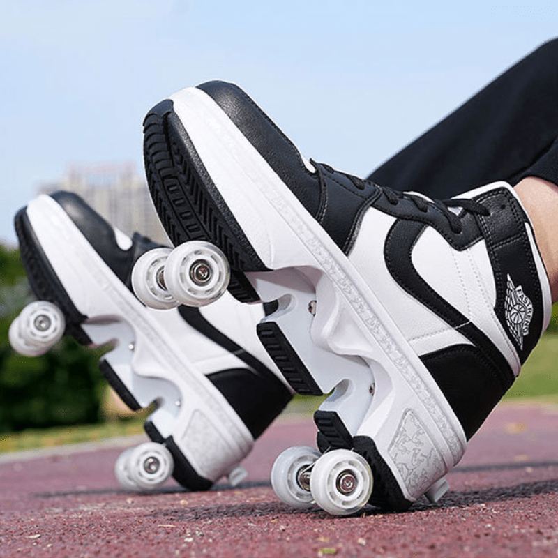 street photo of black and white roller skate shoes with visible pop-out wheels