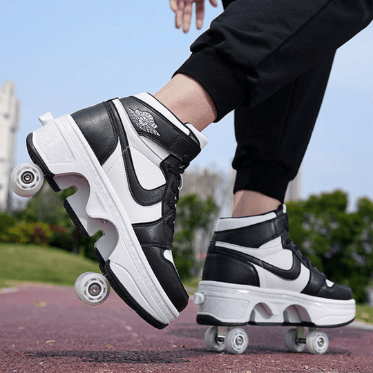 side view of black and white nike roller skate shoes side view on outdoor pavement