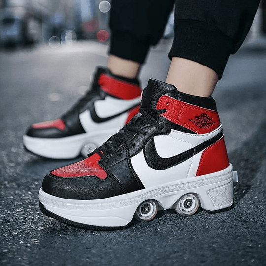 side view of red kick speed roller skate shoes on city street at dusk