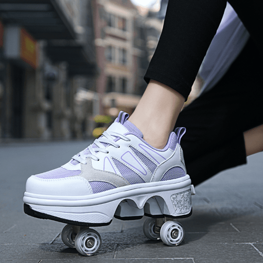 Kick Speed Original Violet roller skate shoes mid-step outdoor on pavement, side view with pop-out wheels
