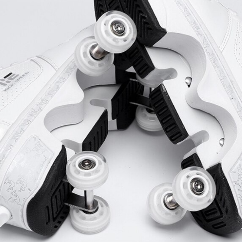 close-up view of retractable wheel system under Kick Speed white roller skate shoes, showing sole and wheel detail