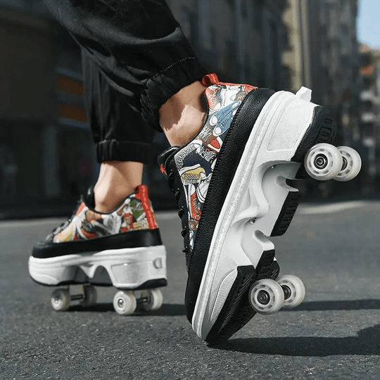 side view of black roller shoes with multicolor comic design, person skating outdoors