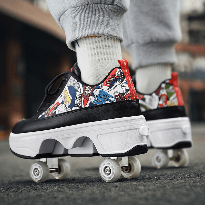 close-up of black shoes with retractable wheels, comic print design visible