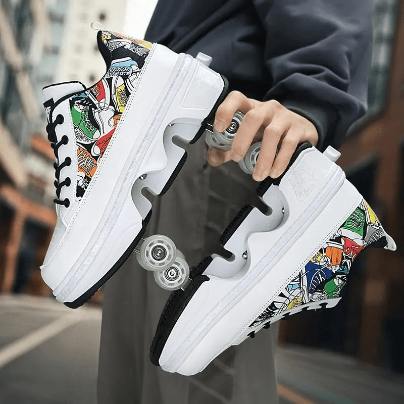 white roller shoes with multicolor comic design, person holding sneakers in hand