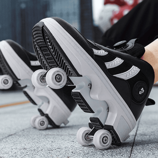 close up bottom view of Kick Speed Triple Arc black roller shoes, modern fashion sneakers with wheels
