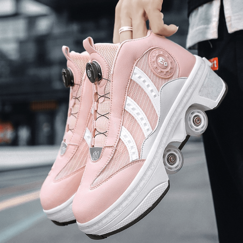 woman holding pink Kick Speed roller skate shoes with retractable wheels